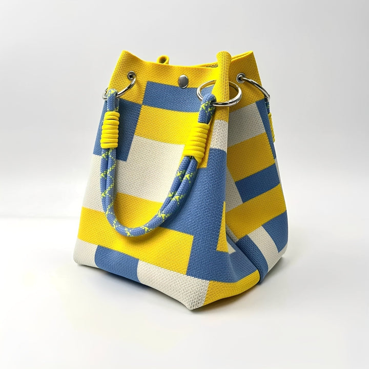 Bolsa de ombro Mollie amarela, perfeita para looks de verão e acessórios de moda feminina.