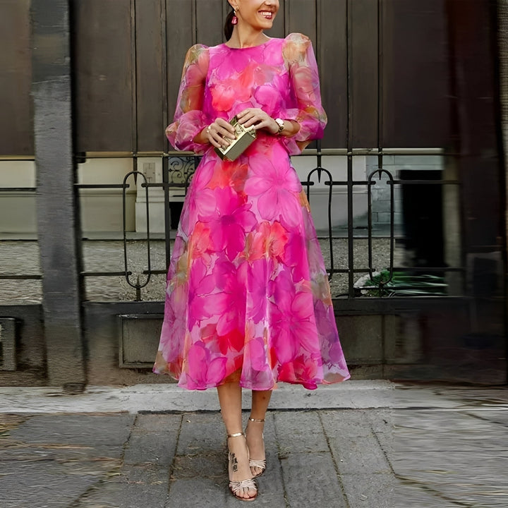 Vestido midi feminino elegante com estampa floral colorida, perfeito para moda primavera verão e ocasiões casuais chiques.