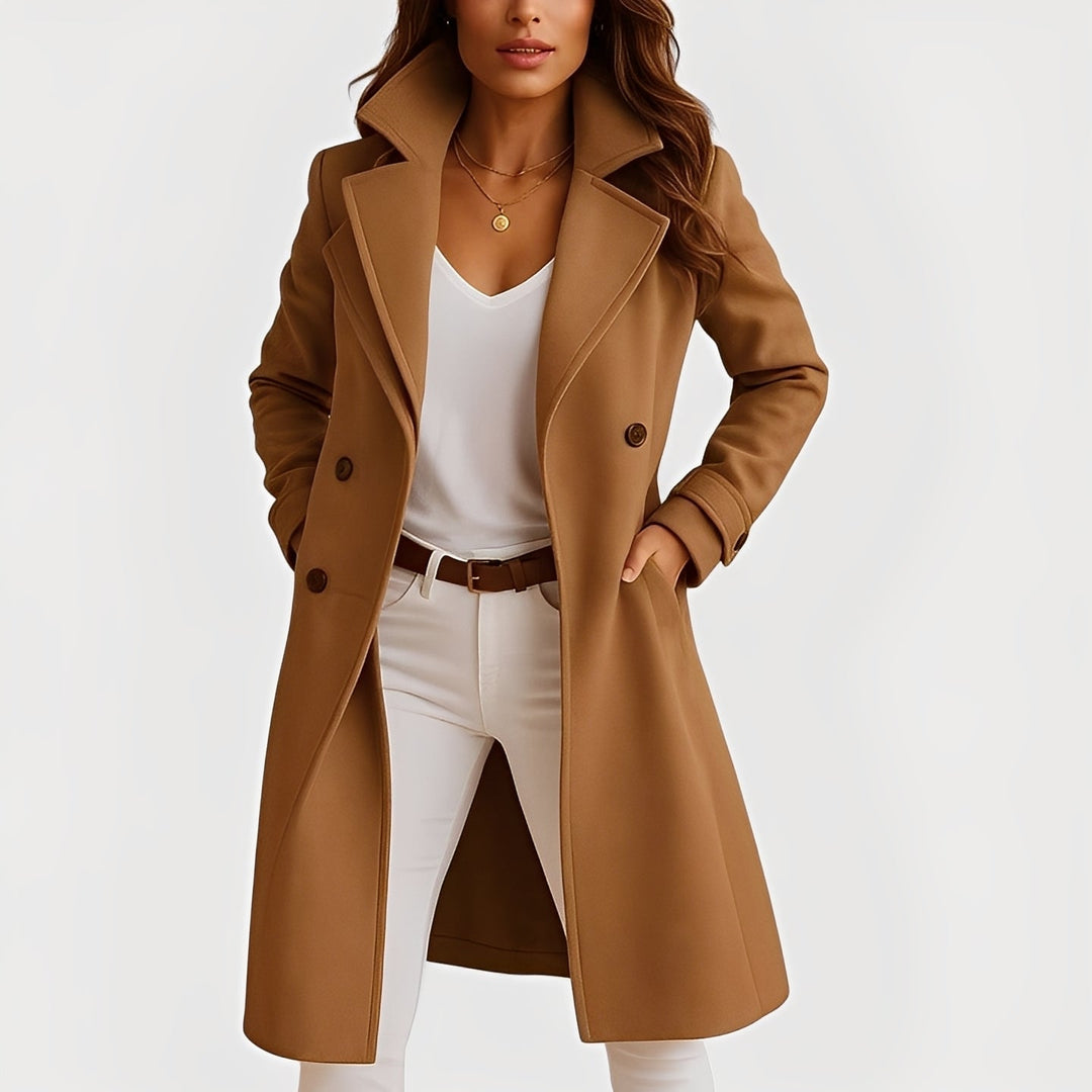 Casaco feminino longo elegante com bolsos para inverno. Peça sofisticada de moda feminina para outono inverno.