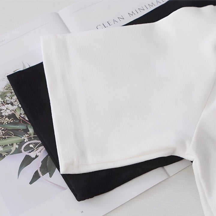 Blusa feminina estampada Selina. Peça versátil e elegante para looks casuais de verão. Conforto e moda feminina.