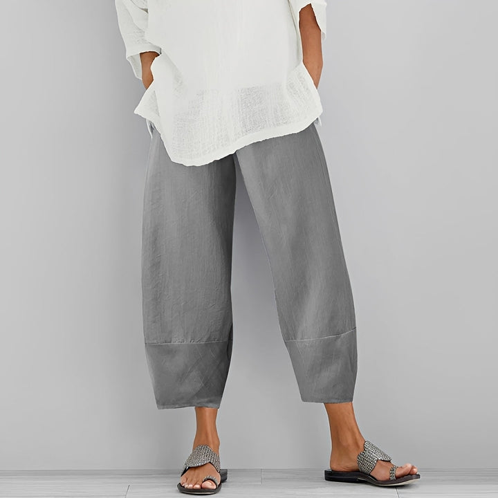 Calças Mariam femininas, soltas e casuais. Perfeitas para o verão e conforto diário. Roupa feminina versátil.