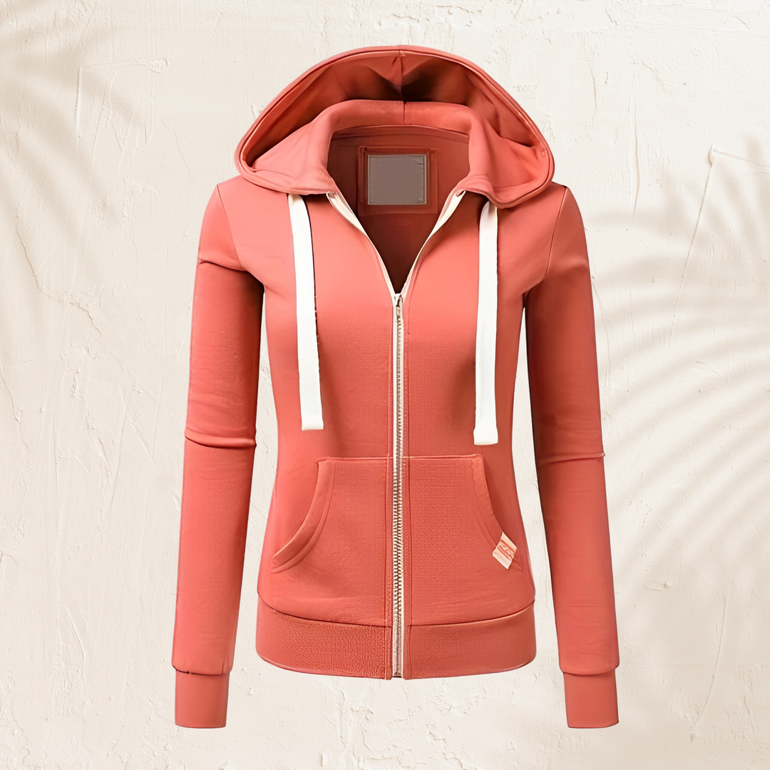 Moletom feminino elegante com zíper e capuz, oferece conforto versátil para dias frios e casuais.