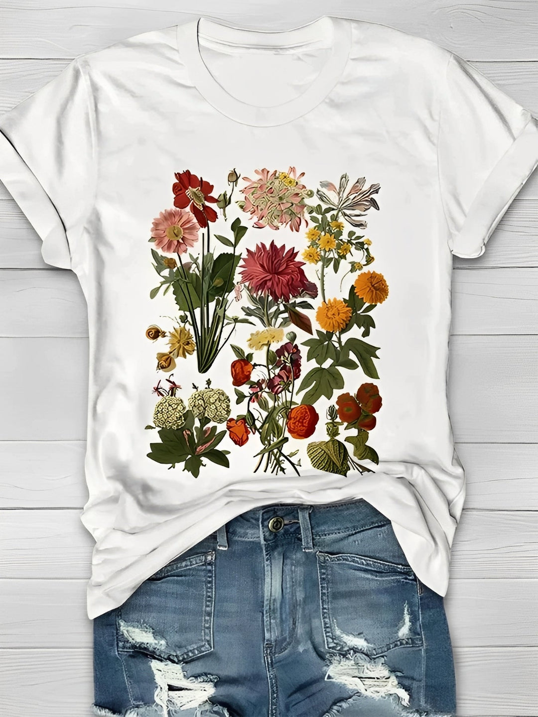 Camiseta feminina elegante com estampa floral vintage, ideal para primavera/verão. Conforto e estilo casual.