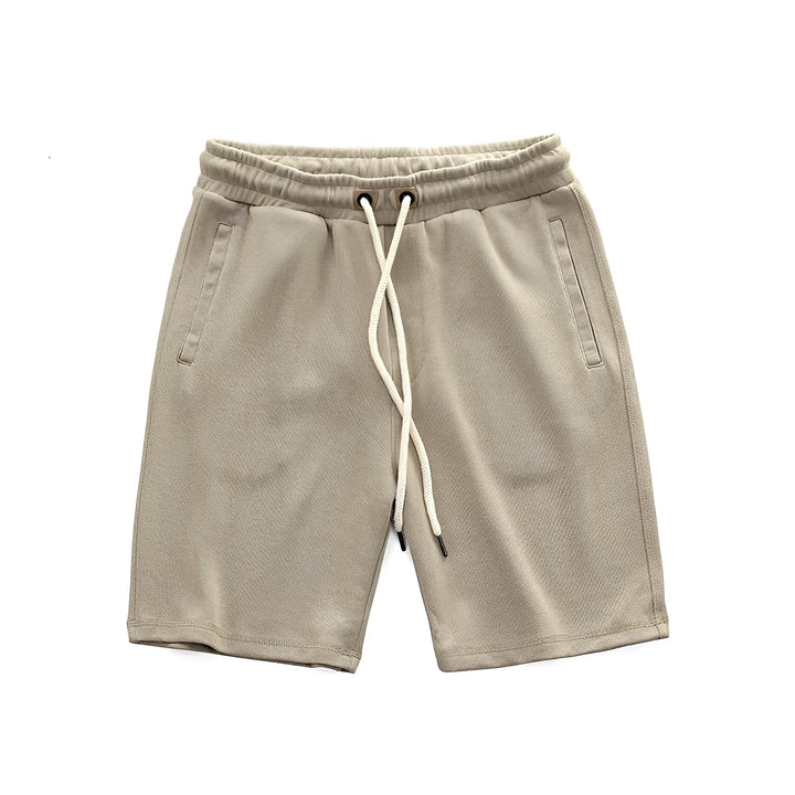 Shorts masculinos clássicos soltos de verão em caqui, perfeitos para conforto casual diário.
