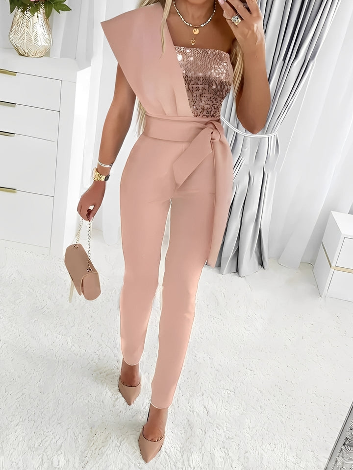 Macacão feminino elegante com efeito glitter para festa. Perfeito para ocasiões especiais e looks de noite.