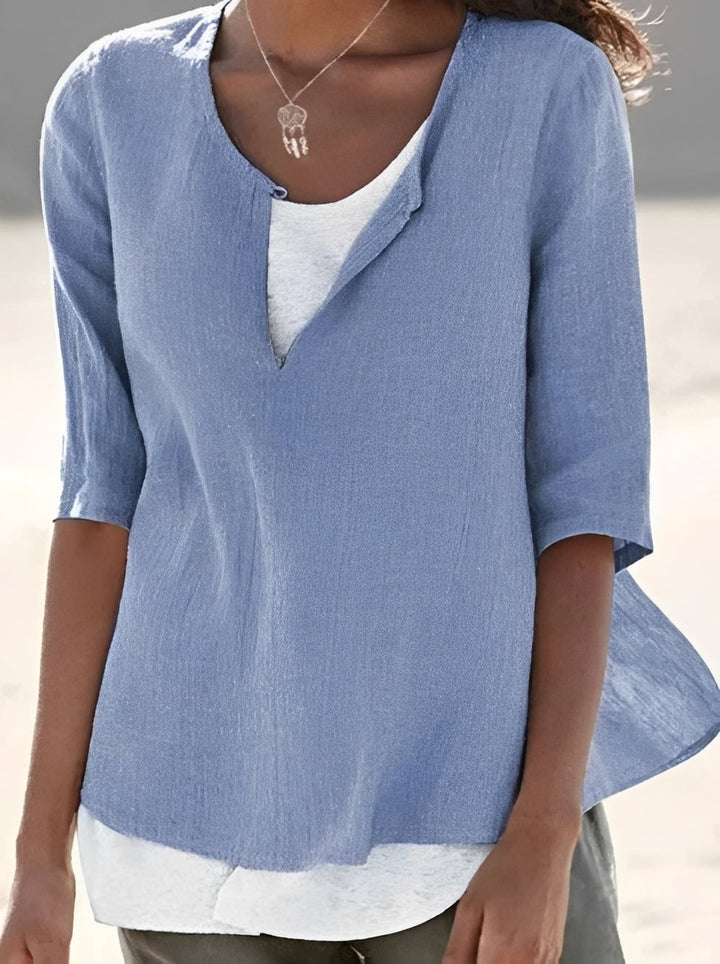 Blusa feminina com camadas, estilo elegante e versátil. Top solto ideal para moda verão e looks casuais.