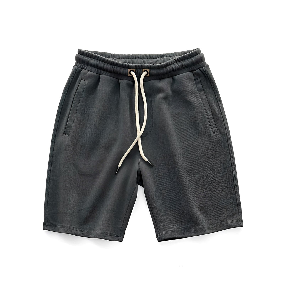 Shorts masculinos cinza soltos para o verão, ideais para um look casual com máximo conforto.