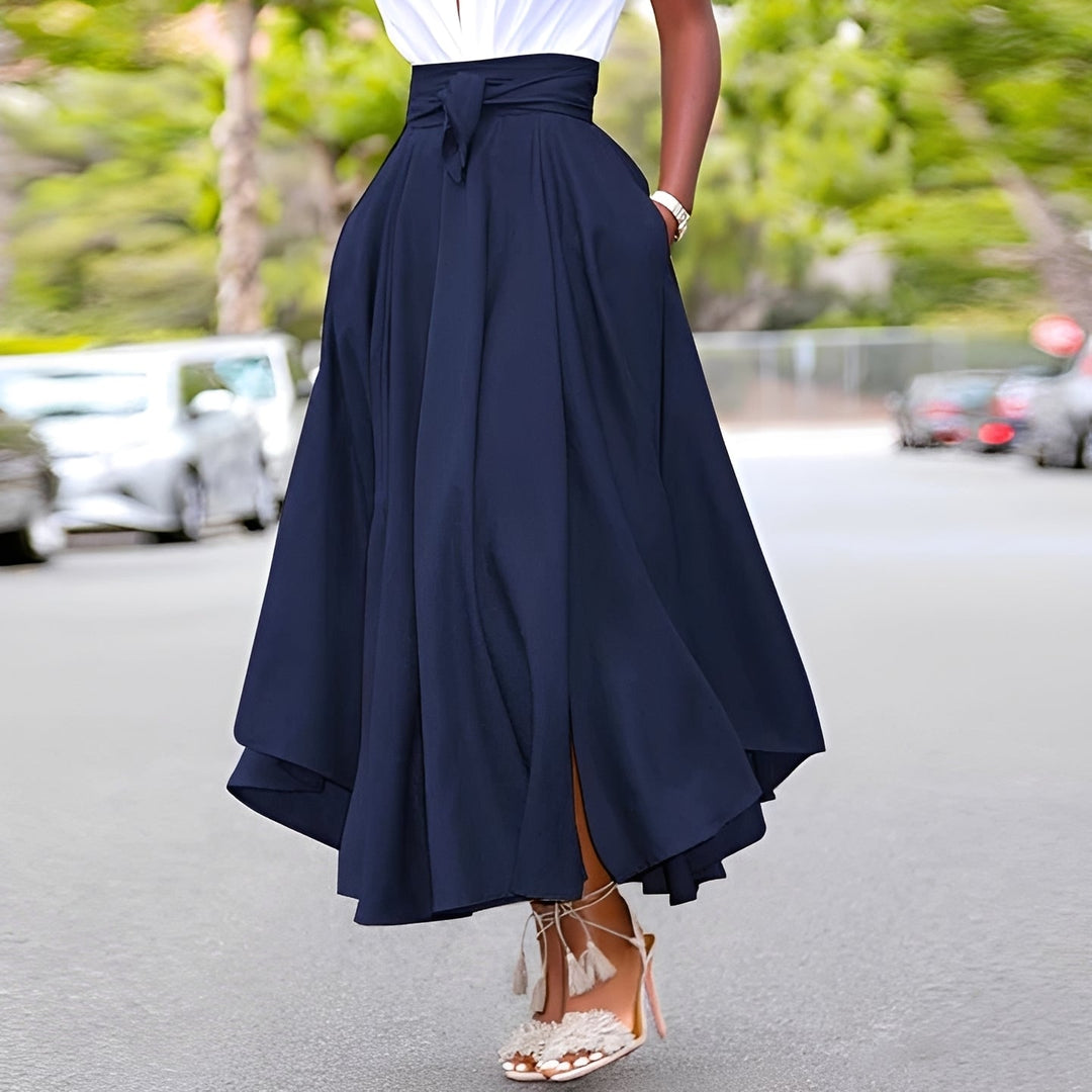 Saia feminina longa plissada para outono/verão, estilo elegante e casual, um item essencial e confortável.