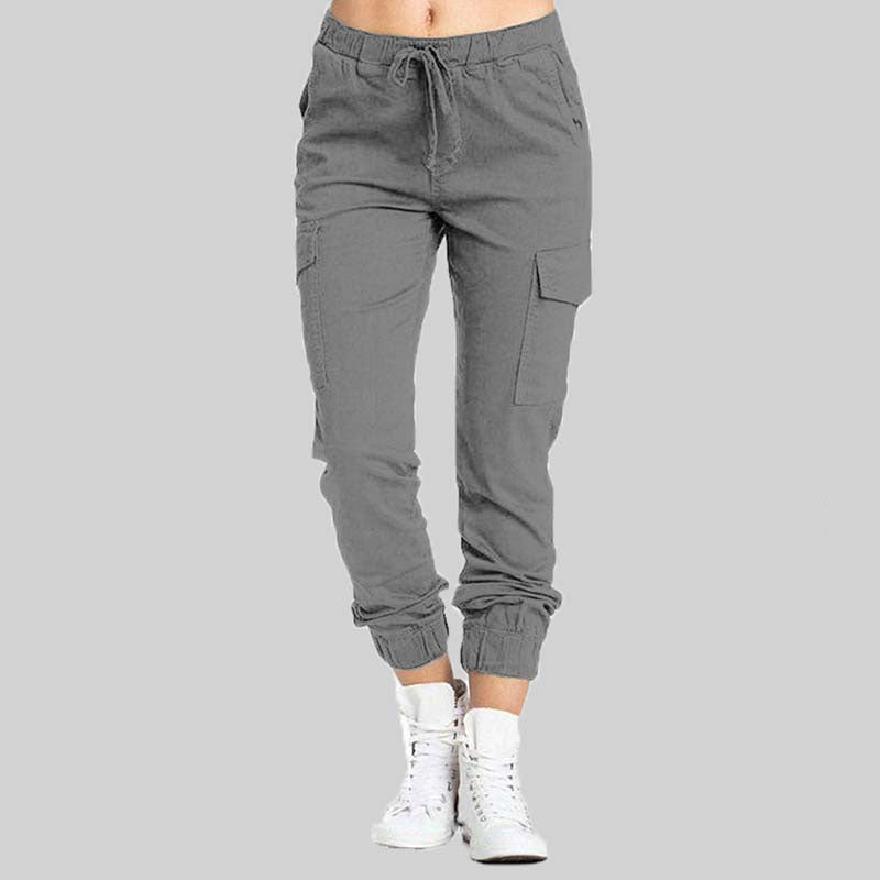 Calças cargo femininas modelo jogger, com cintura elástica para ajuste perfeito e bolsos funcionais.