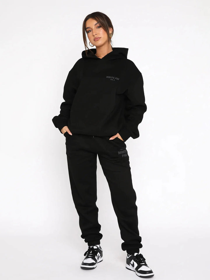 Conjunto de moletom com capuz oversized para mulher, fato de treino descontraído, perfeito para o dia a dia.
