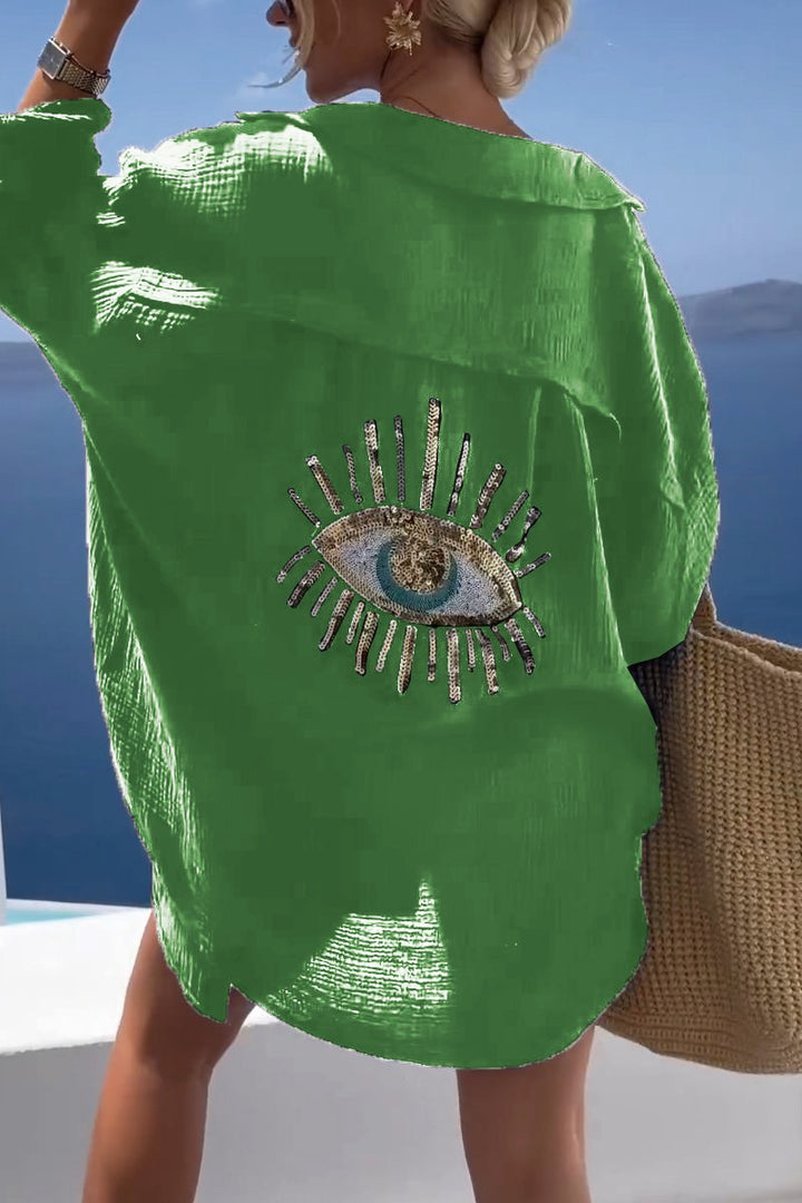 Camisa de verão feminina oversize, com bordado exclusivo, combinando elegância e conforto para o dia a dia.