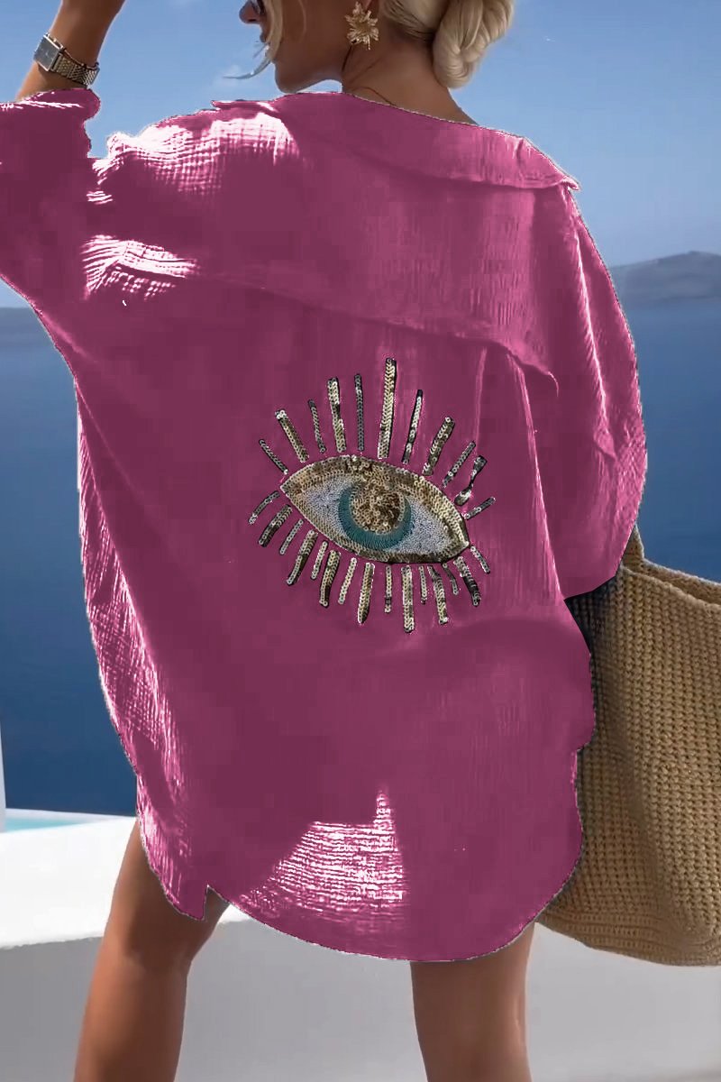 Elegante camisa feminina de manga longa, estilo oversize com bordado sutil, perfeita para o verão.