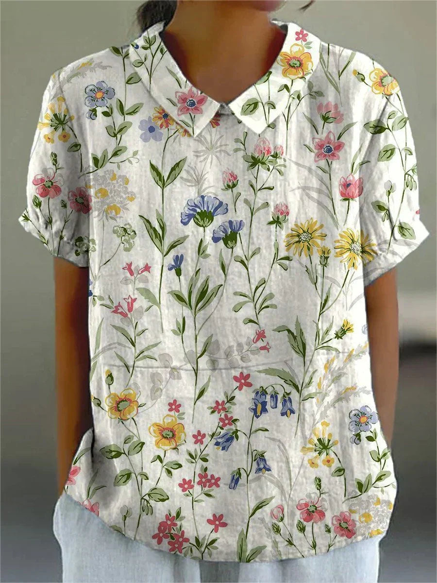 Camisa feminina casual com estampa floral retrô. Perfeita para primavera-verão, estilo elegante e confortável.