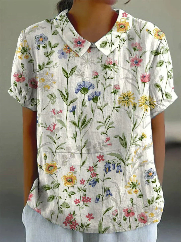 Camisa feminina casual com estampa floral retrô. Perfeita para primavera-verão, estilo elegante e confortável.