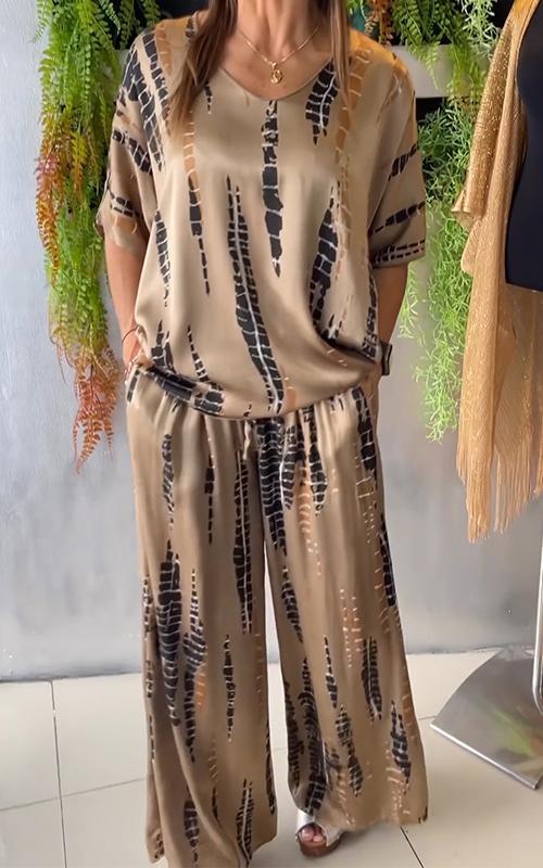 Conjunto feminino estampado casual de verão, roupa versátil para conforto e estilo.