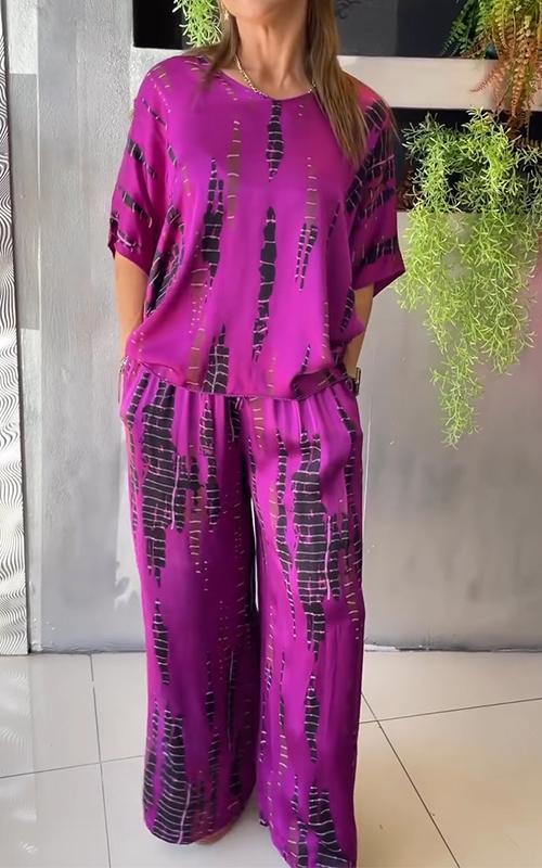 Conjunto feminino estampado de duas peças versátil, ideal para moda casual e viagens de verão.
