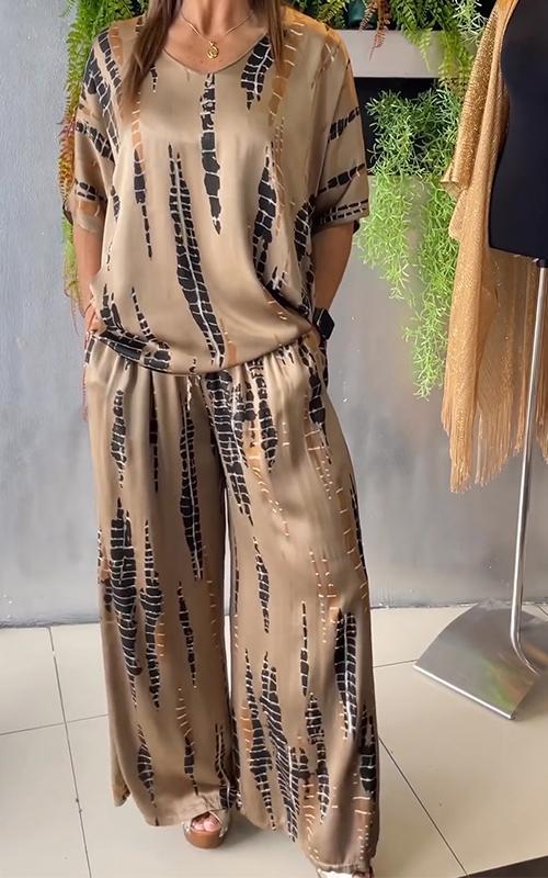 Conjunto feminino estampado elegante para um look casual de verão, unindo conforto e estilo.
