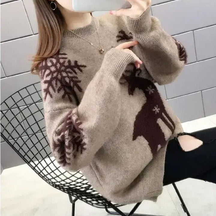 Camisola de malha de mulher oversize, quente e confortável com estampado de rena. Essencial para outono/inverno.