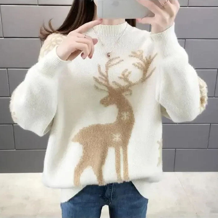 Camisola de malha mulher com estampado de rena, estilo oversize. Ideal para vestuário casual e celebrações de Natal.