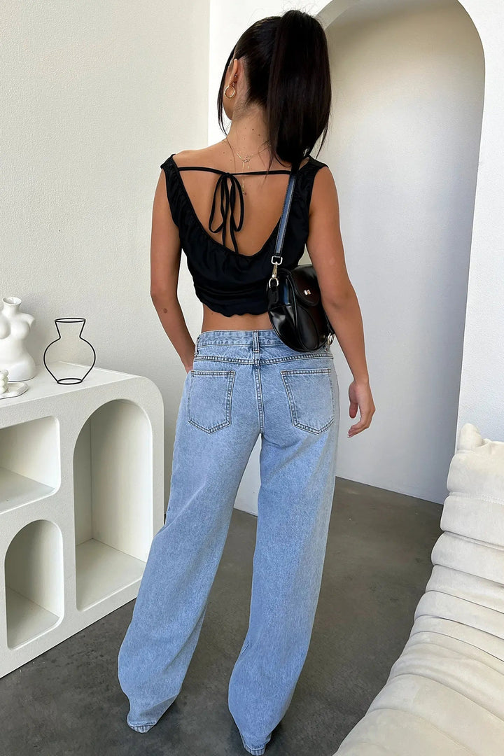 Jeans para mulher: calça perna larga cintura baixa, conforto e estilo na moda outono/inverno, tendência casual.