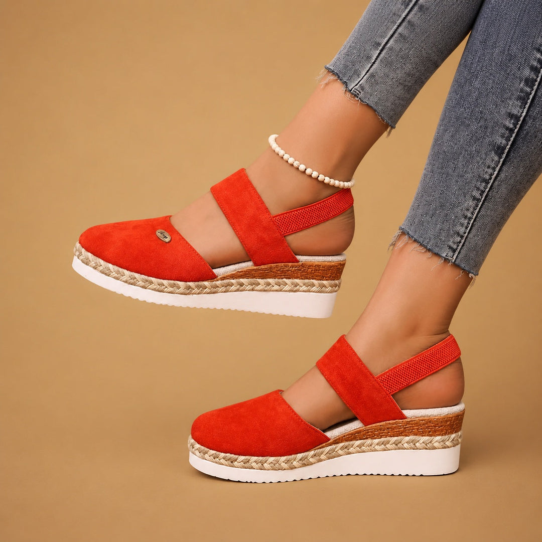 Sandálias Leonor plataforma alpargatas, perfil lateral, calçado feminino de verão com conforto e estilo.