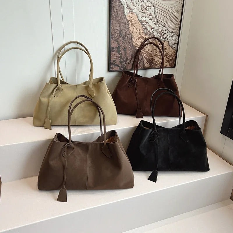 Bolsa feminina elegante, funcional e grande, ideal para trabalho e lazer.