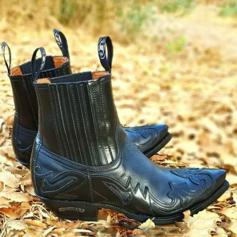 Botim cowboy feminino de couro, com bico fino e salto cubano, perfeito para moda e estilo western autêntico.