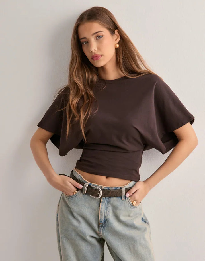 Top feminino de manga longa elegante e confortável, peça essencial para o outono e inverno.