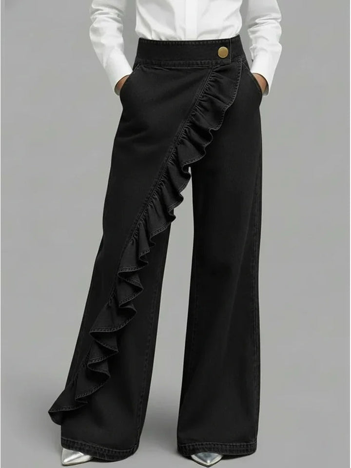 Jeans preto perna larga mulher, cintura alta com folhos, roupa versátil para looks casuais e elegantes.