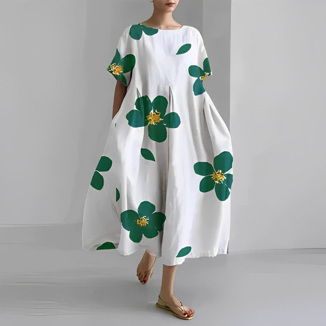 Vestido maxi feminino com estampa floral boho, perfeito para dias de primavera e verão. Conforto e estilo casual.