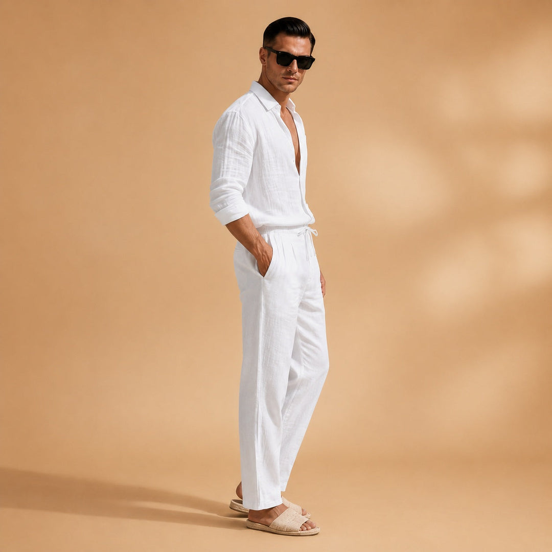 Conjunto casual de linho azul marinho para homem, com camisa manga longa e calças, perfeito para conforto no verão.