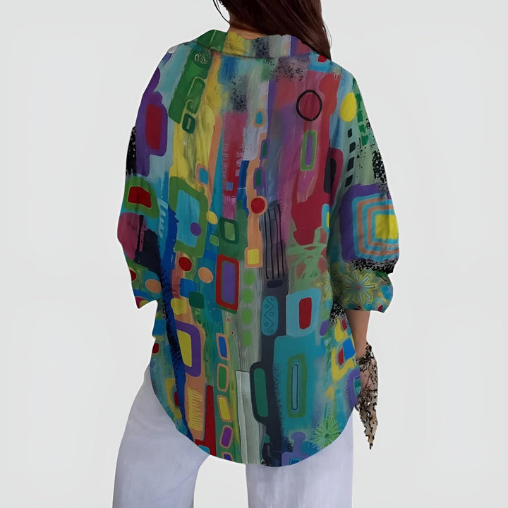 Blusa feminina com estampa geométrica, perfeita para um visual elegante e confortável. Ideal para o verão e estilo casual moderno.