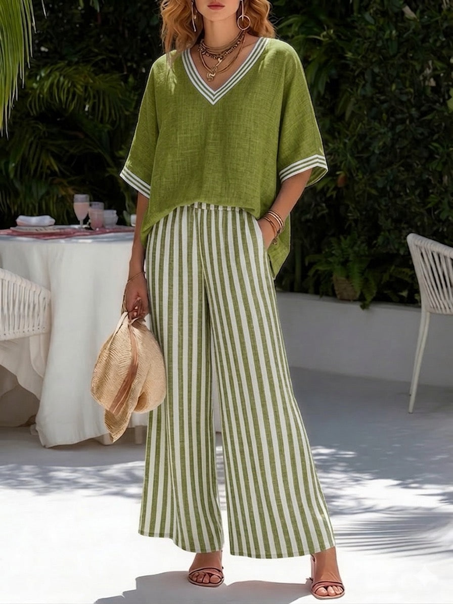 Mulher estilosa vestindo conjunto feminino de linho riscado, casual e elegante para dias quentes.