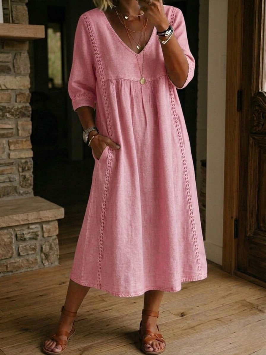 Vestido amplo para mulher, midi com renda e bolsos, combinando praticidade e um estilo chic para o dia a dia.
