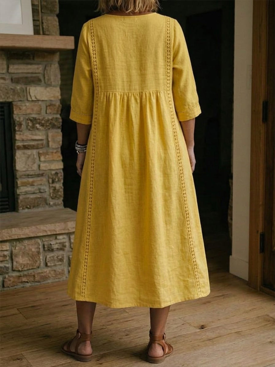 Vestido feminino midi solto com renda, perfeito para um estilo casual chic, confortável e versátil.