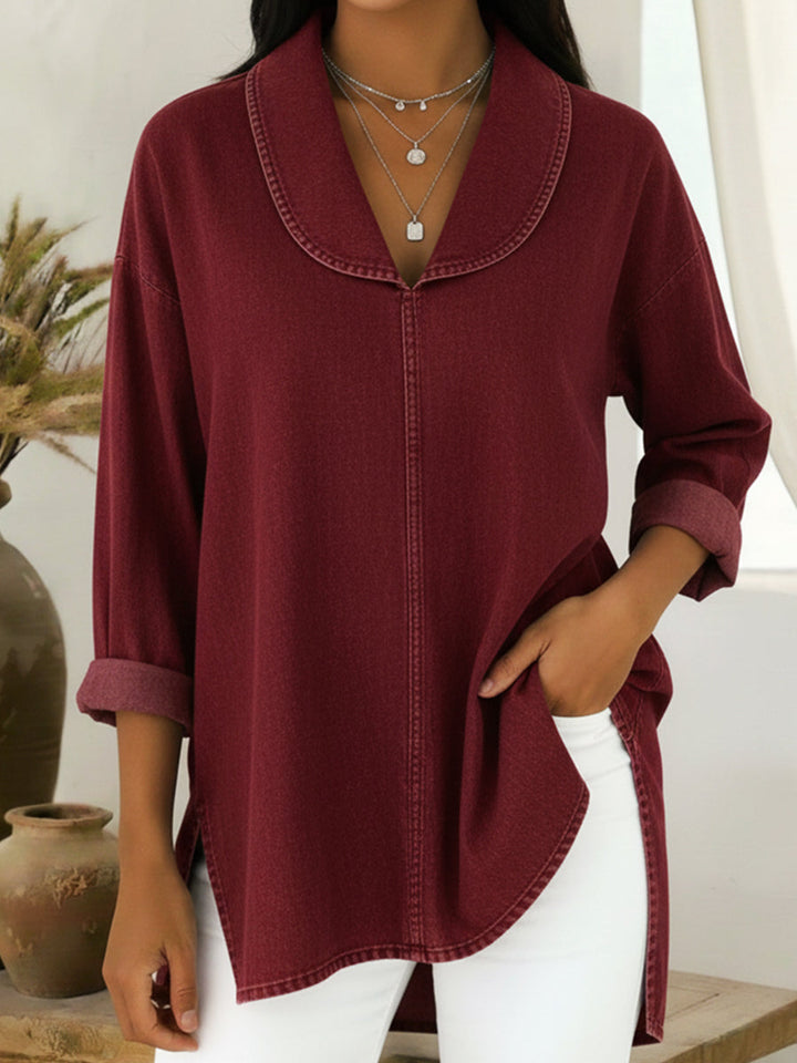 Top feminino retro elegante com colarinho de chal, ideal para look vintage e sofisticado.