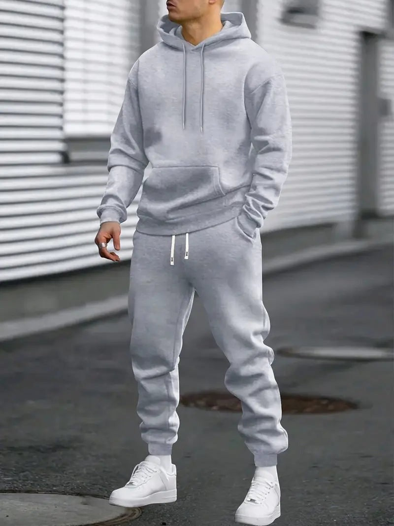 Conjunto hoodie e calças jogger masculino cinzento para conforto diário e estilo casual. Perfeito para o homem moderno.