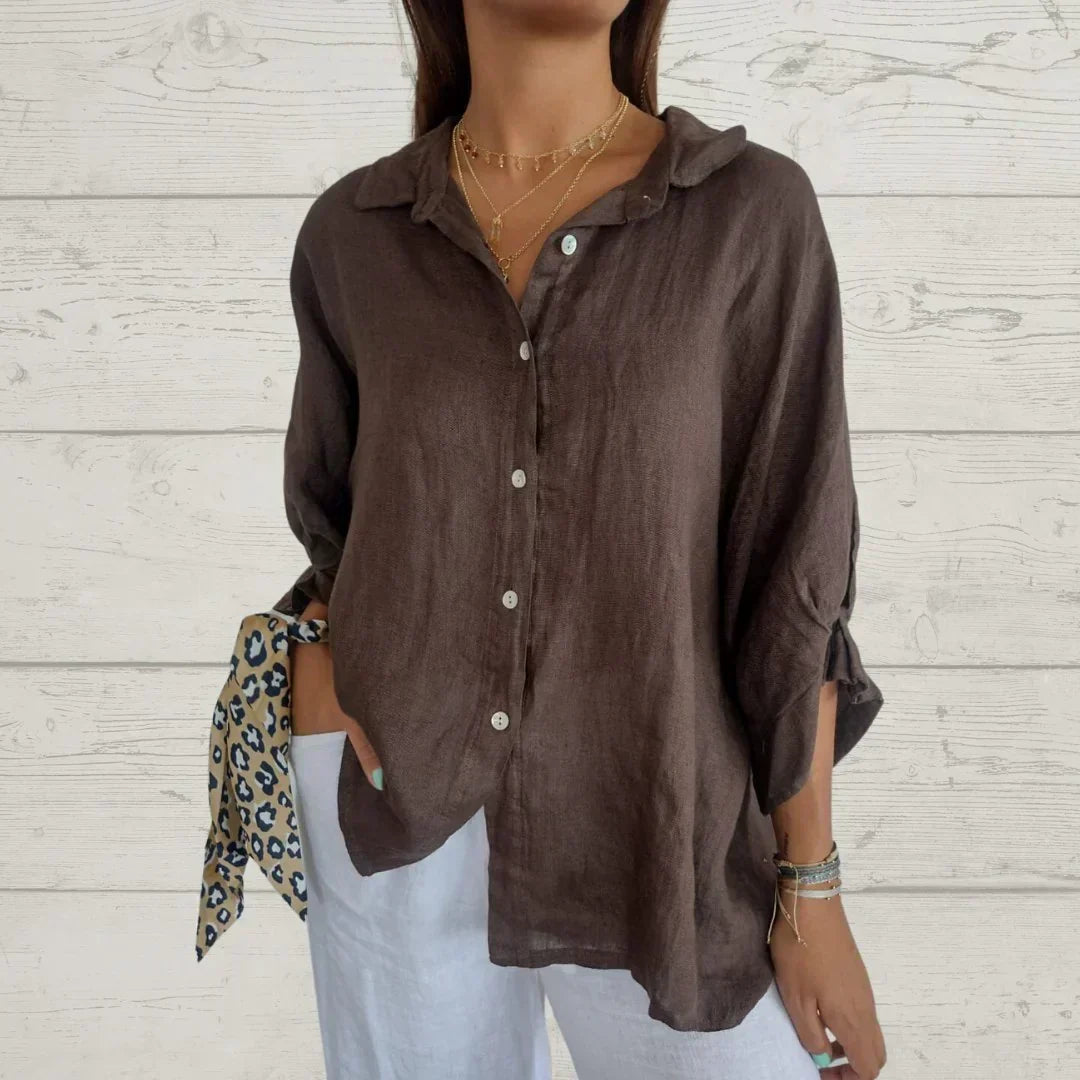 Blusa feminina com botões, ideal para trabalho ou casual. Estilo confortável, moda primavera e verão.