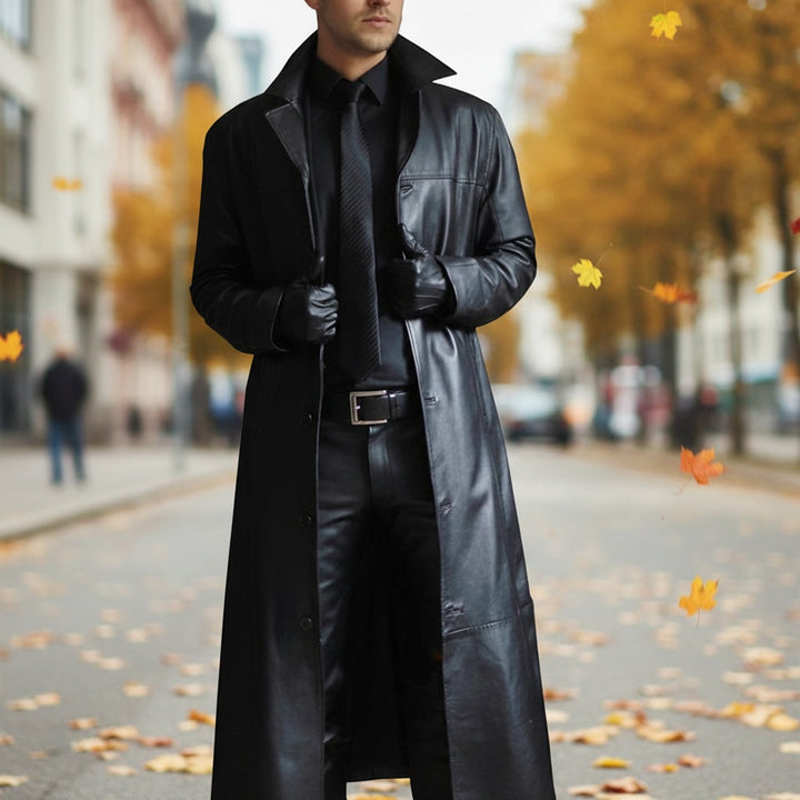 Casaco de couro masculino comprido com gola clássica, ideal para inverno e outono. Elegante e moderno.
