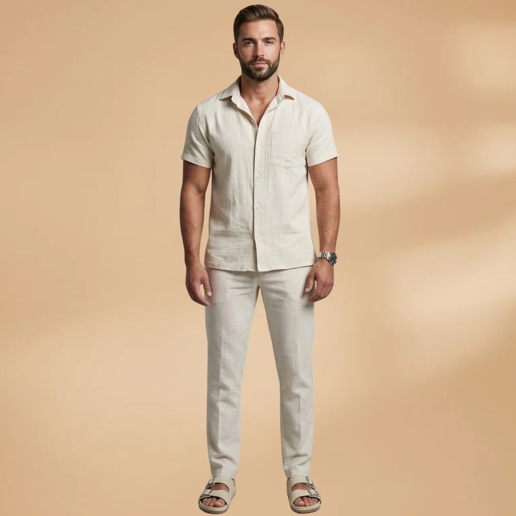 Homem com conjunto de linho respirável Salvador, camisa e calças masculinas leves para um verão elegante e confortável.