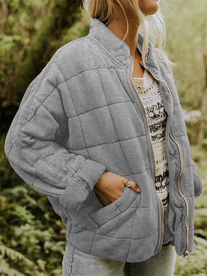 Casaco feminino acolchoado, estilo bomber, gola alta com fecho, quente e versátil para o frio.