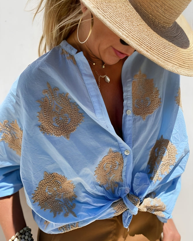 Blusa feminina elegante e versátil para o dia a dia, ideal para trabalho e lazer.