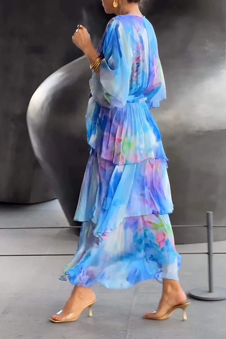 Maxi vestido feminino azul vibrante, longo e elegante para o verão. Ideal para festas, praia ou look casual de estilo.
