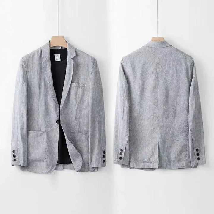 Terno de linho cinza claro masculino, ideal para eventos formais de verão. Leve, respirável e moderno.