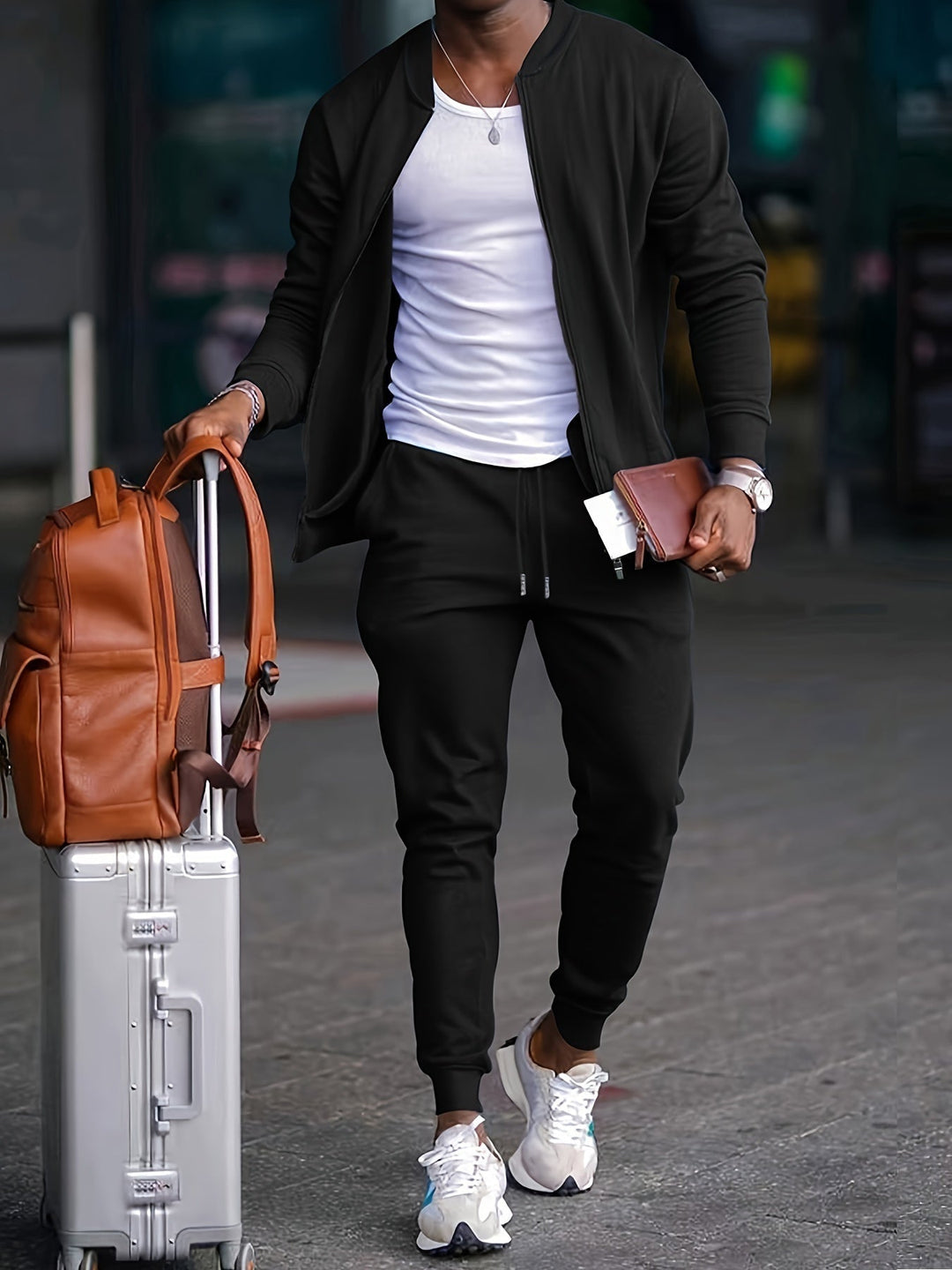 Conjunto de treino masculino jogger com jaqueta zip, confortável para desporto e lazer. Roupa desportiva moderna.