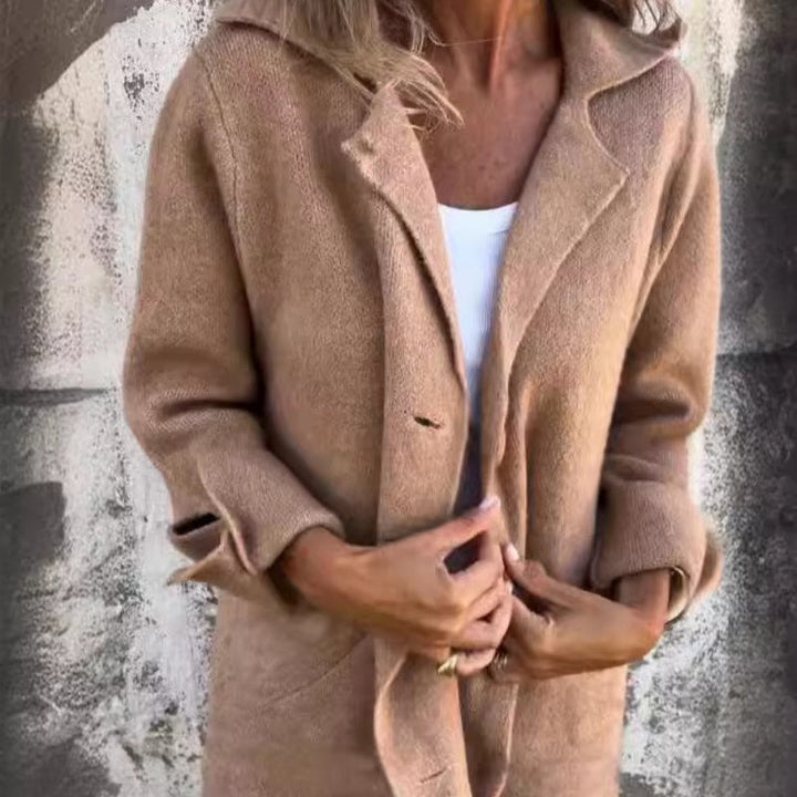 Jaqueta casual cinza feminina, comprimento médio, perfeita para os dias frios de outono inverno.
