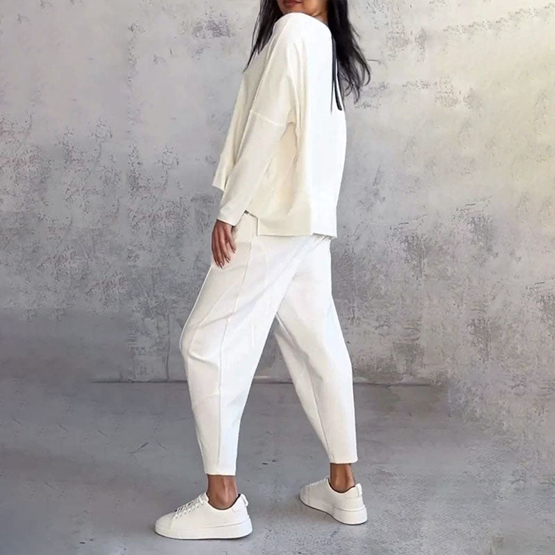 Roupa versátil ROSE: conjunto feminino elegante com blusa e calça social. Ideal para trabalho e eventos.