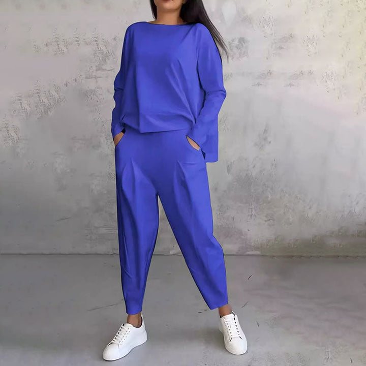 Conjunto feminino ROSE, blusa elegante e calça de cintura alta. Conforto e sofisticação para qualquer ocasião.