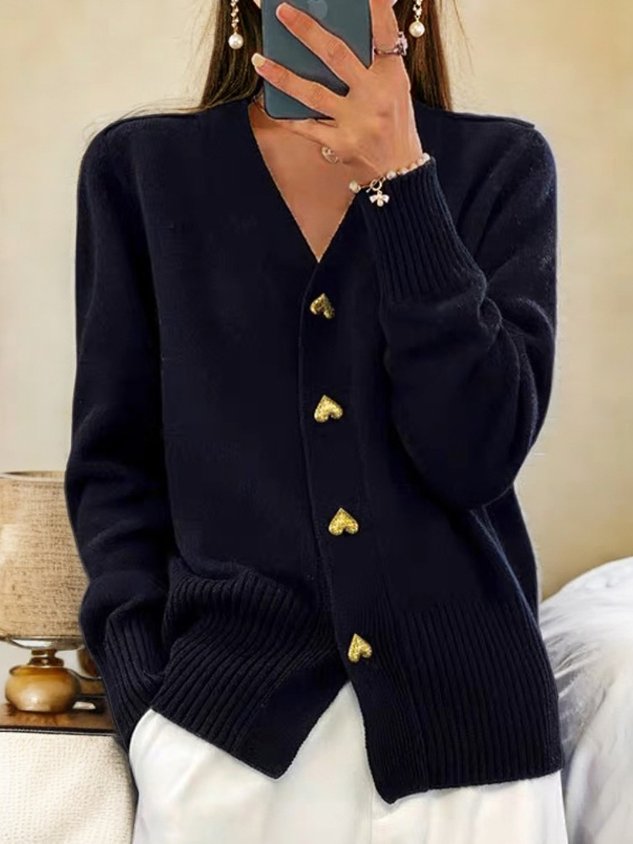 Colete feminino elegante, sem manga, com decote V e botões. Roupa versátil para moda casual e confortável em todas estações.