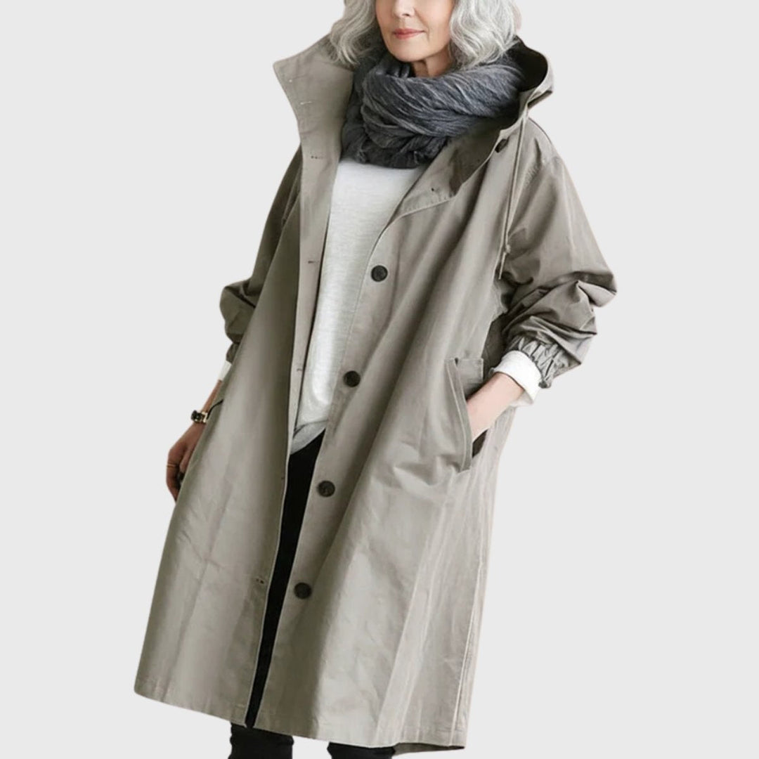 Gabardina comprida impermeável feminina preta com capuz e corte largo, perfeita para outono/inverno e proteção.